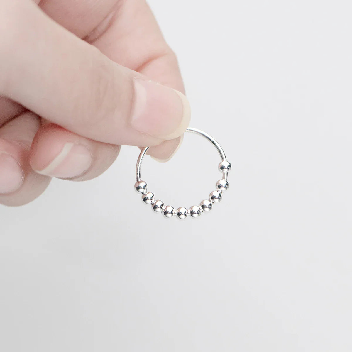 Prsten Antistresový kroužek a otáčející se perly pro muže nebo ženy stříbrný