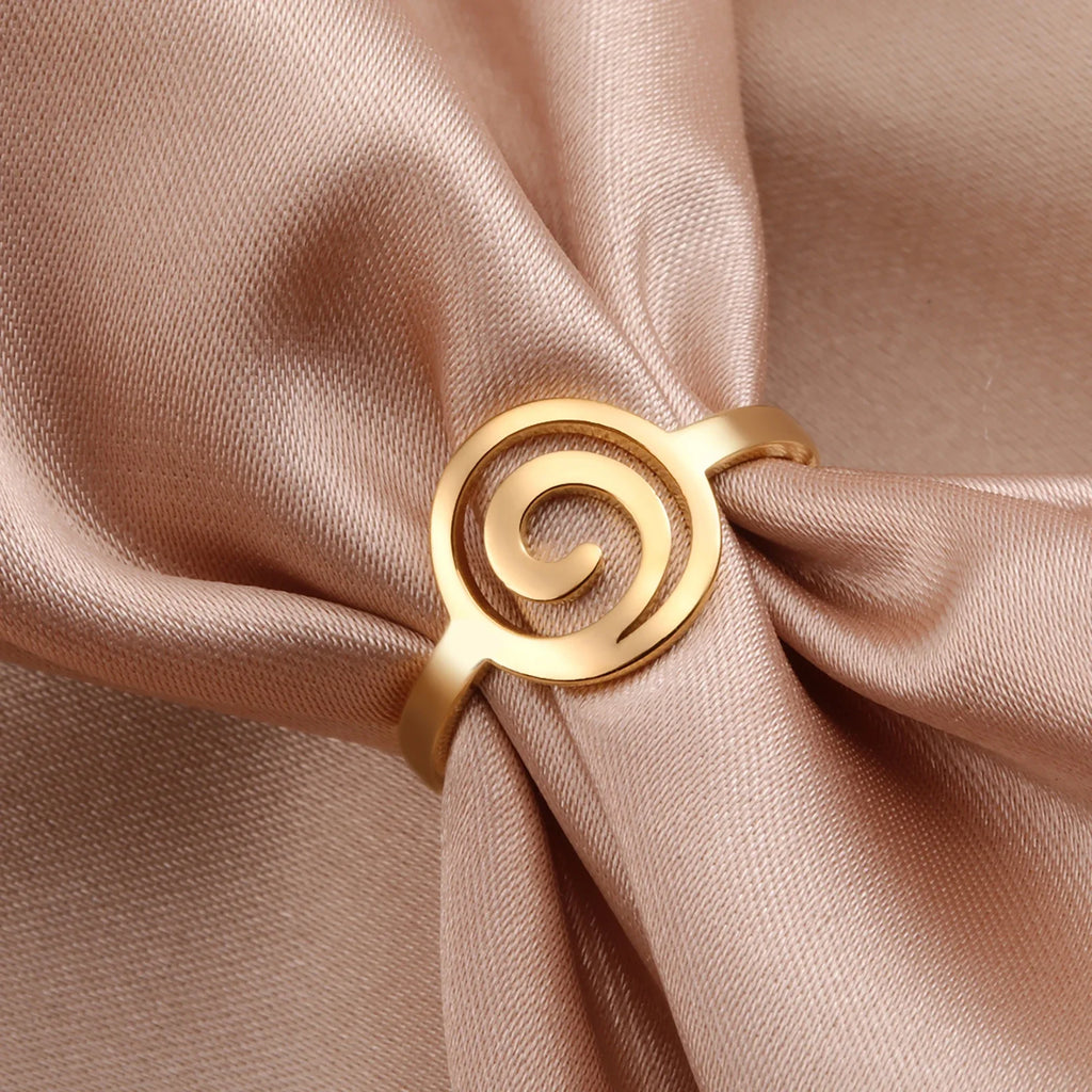 Damering med spiraldesign i rundt guld