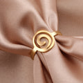 Damering med spiraldesign i rundt guld