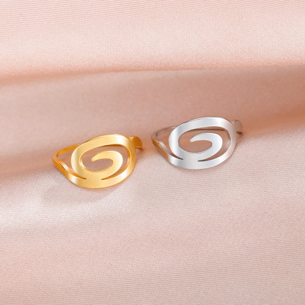 Damering med spiraldesign i guld