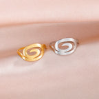 Damering med spiraldesign i guld