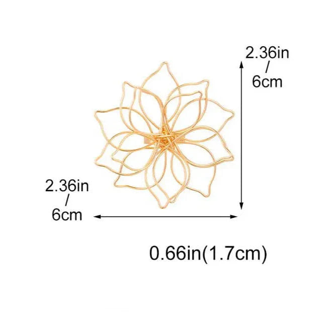 Ring med stor blomst