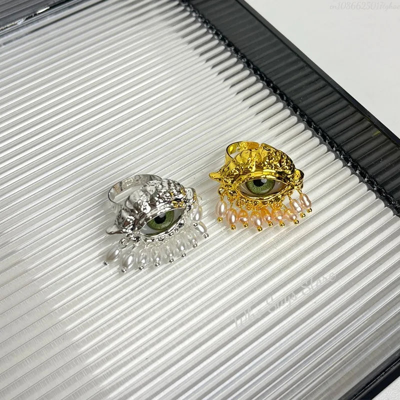 Prsten ochrany s modrým okem a zlatými perličkami