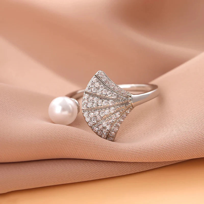 Ring med kamskjell og perleskjell