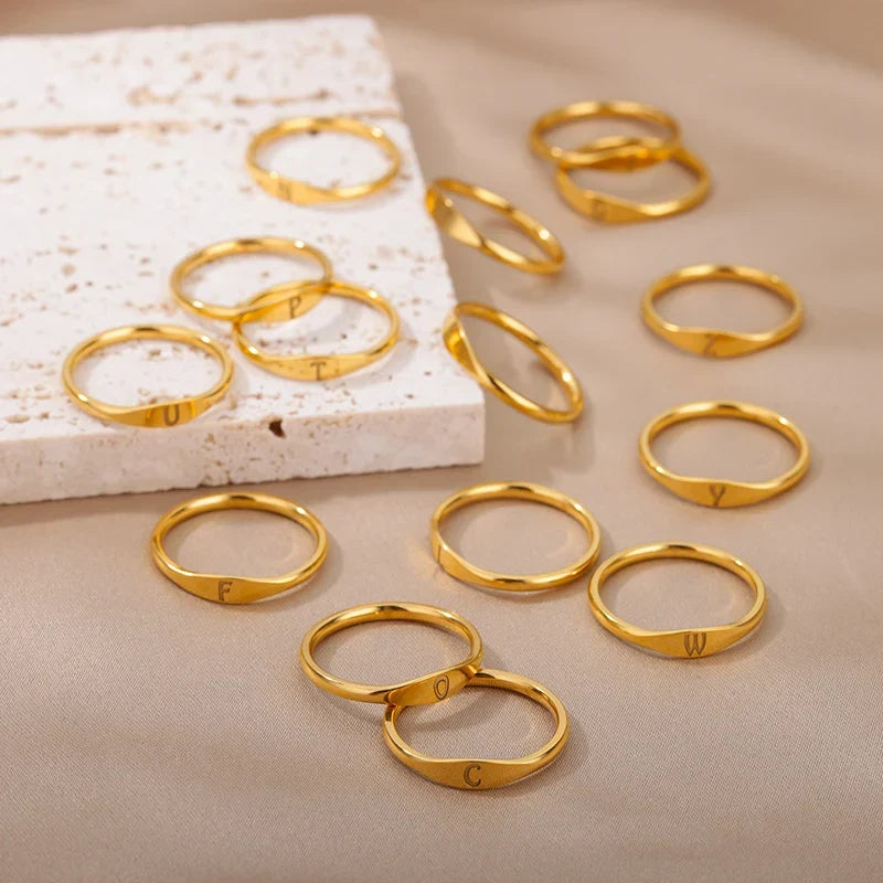 Dame ring initial