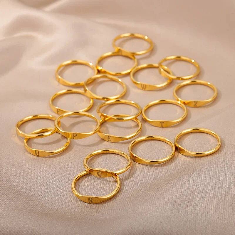 Dame ring initial