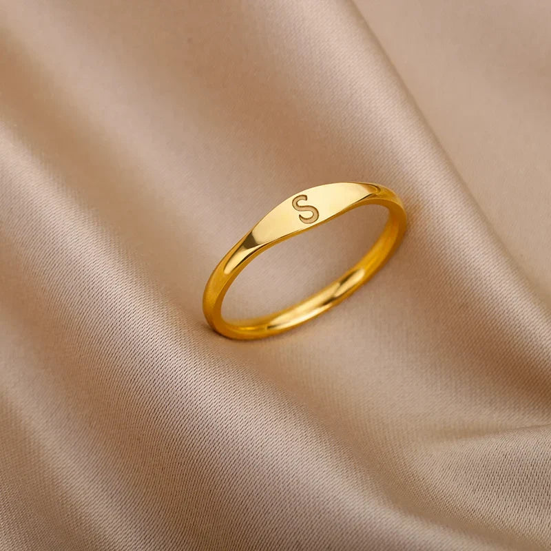 Dame ring initial