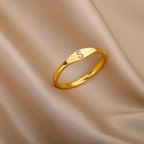 Dame ring initial