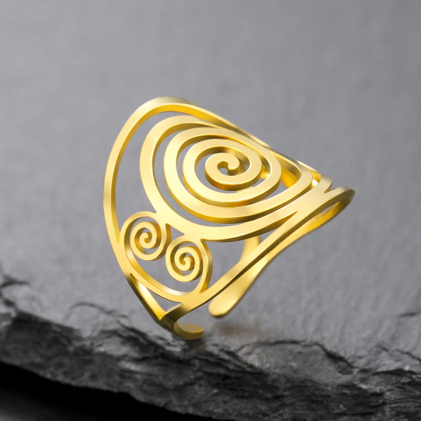 Bred spiralring til kvinder i guld