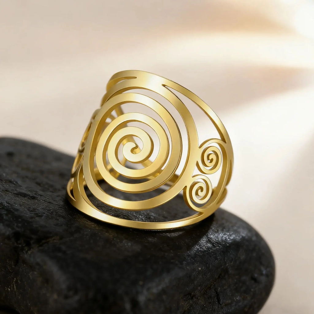 Bred spiralring til kvinder i guld