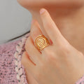 Bred spiralring til kvinder i guld