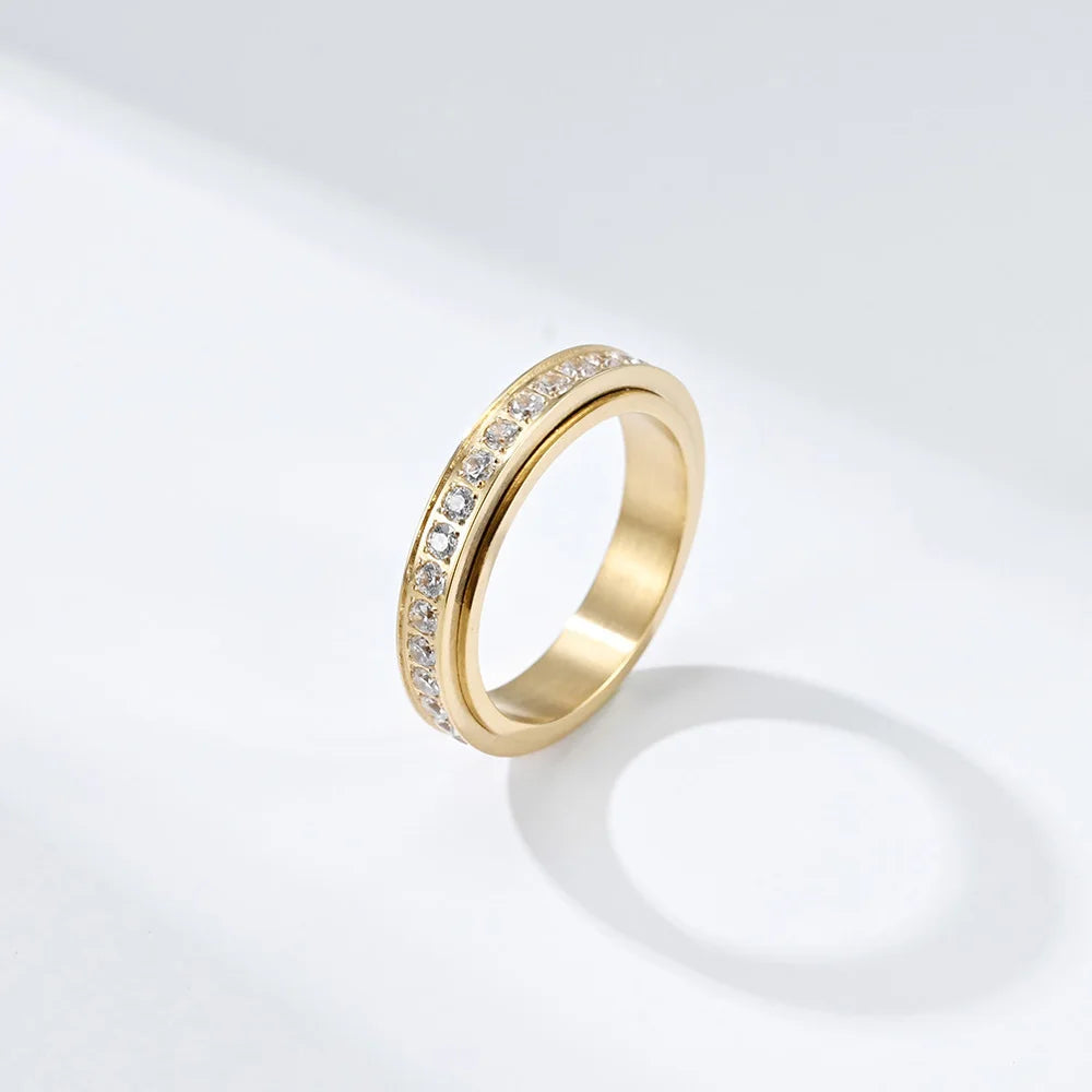 Prsten proti stresu s otočným kroužkem a zirkonem