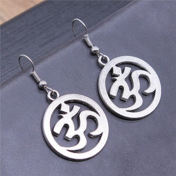 Buddhisme Om sølv øredobb