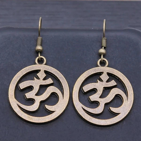 Buddhisme Om bronse øredobb