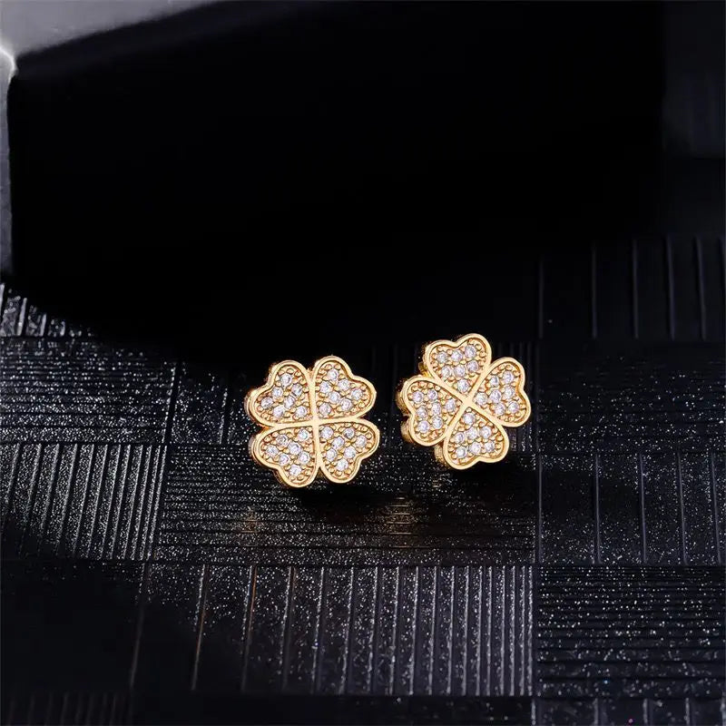 Øreringe med stift og 4-bladede kløver i zircon guld