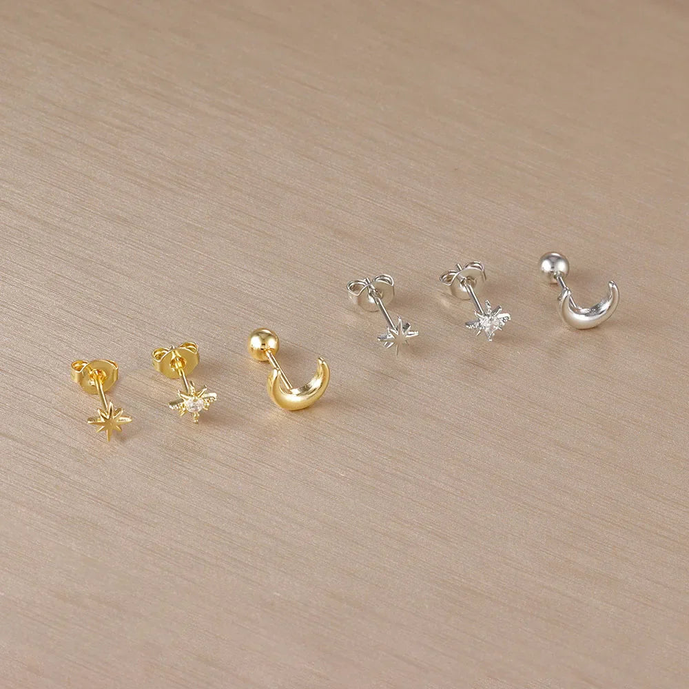 Øredobber med månesigd og stjerner i sølv