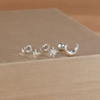 Øredobber med månesigd og stjerner i sølv