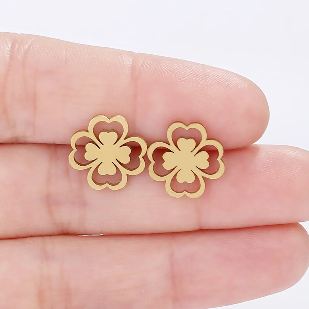 Øreringe i klips med firebladskløver i guld