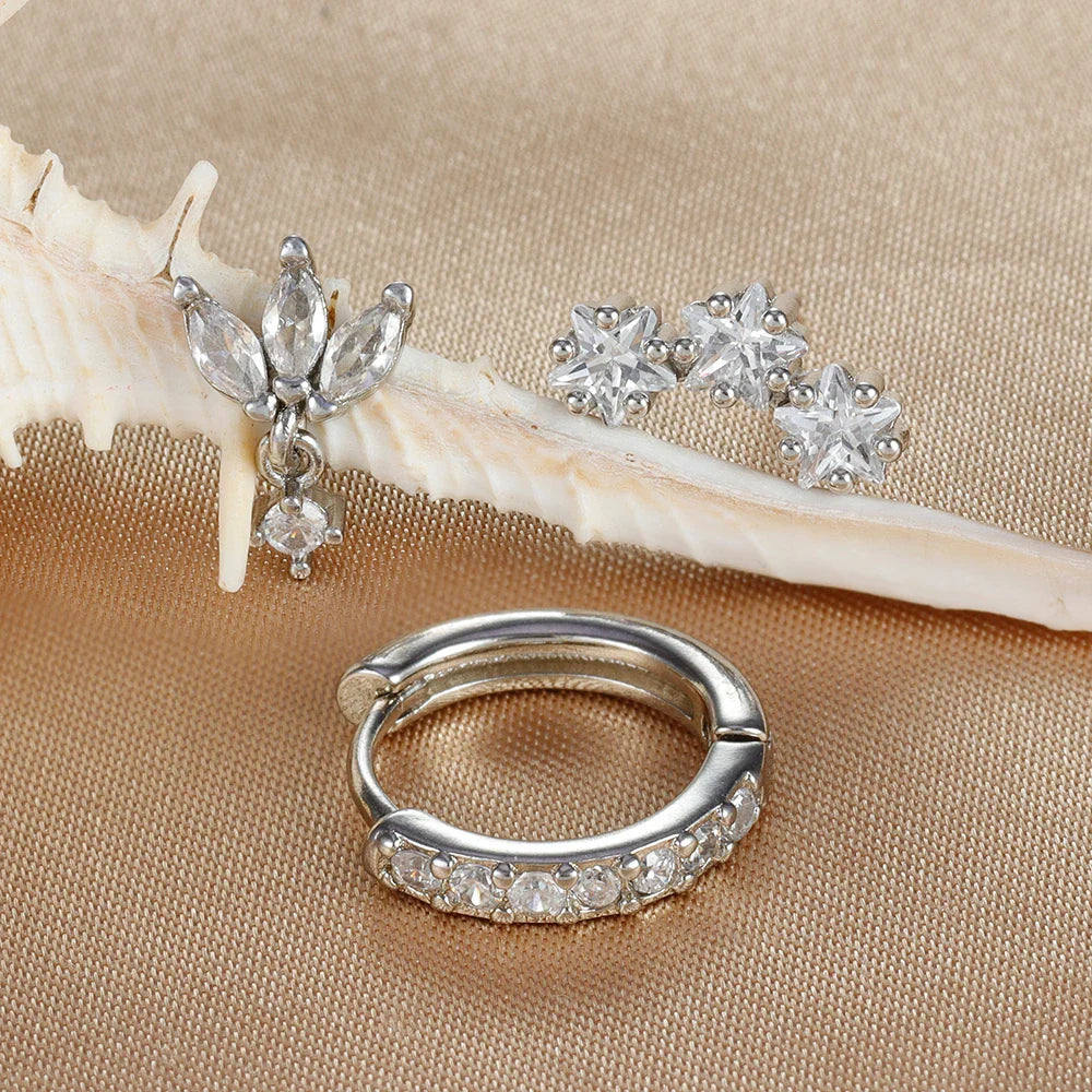 Ørestikker med stjerneformede zirkoner til kvinder i sølv