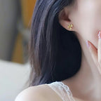 Elegante blomster ørestikker