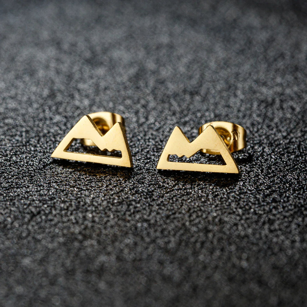 Minimalistiska bergörhängen i guld