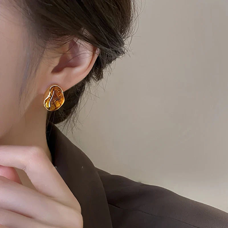 Ørestikker med tigerøje beskyttelse til kvinder