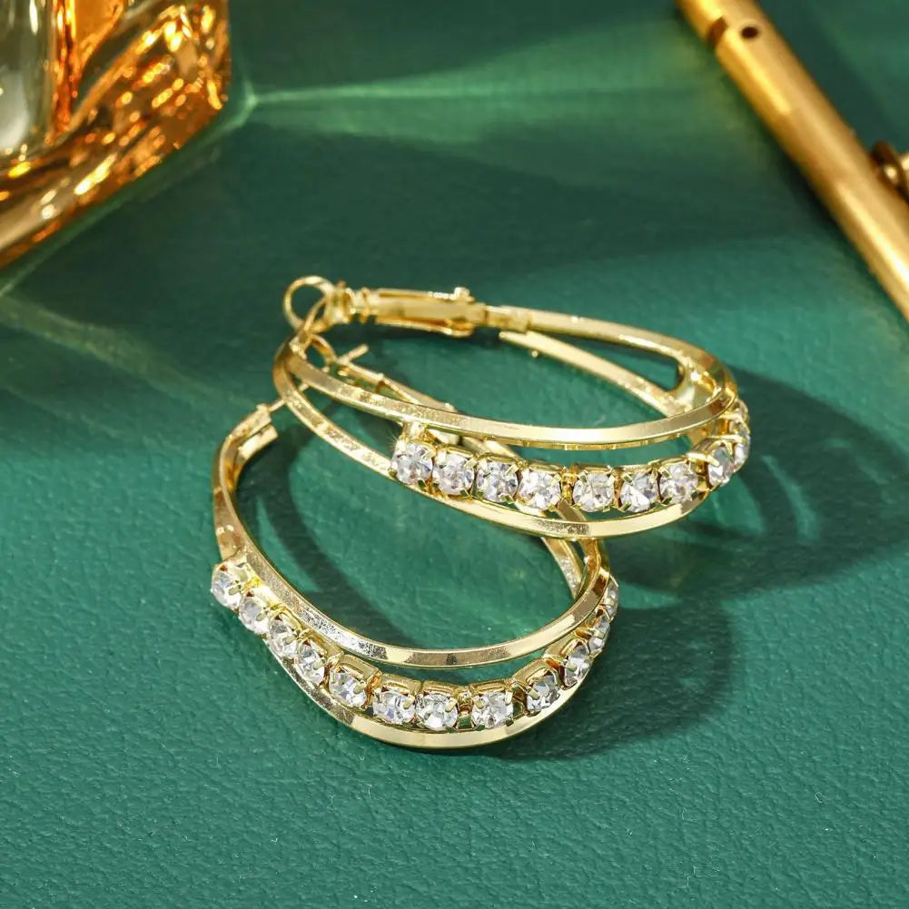 Øreringe med strass i guld 