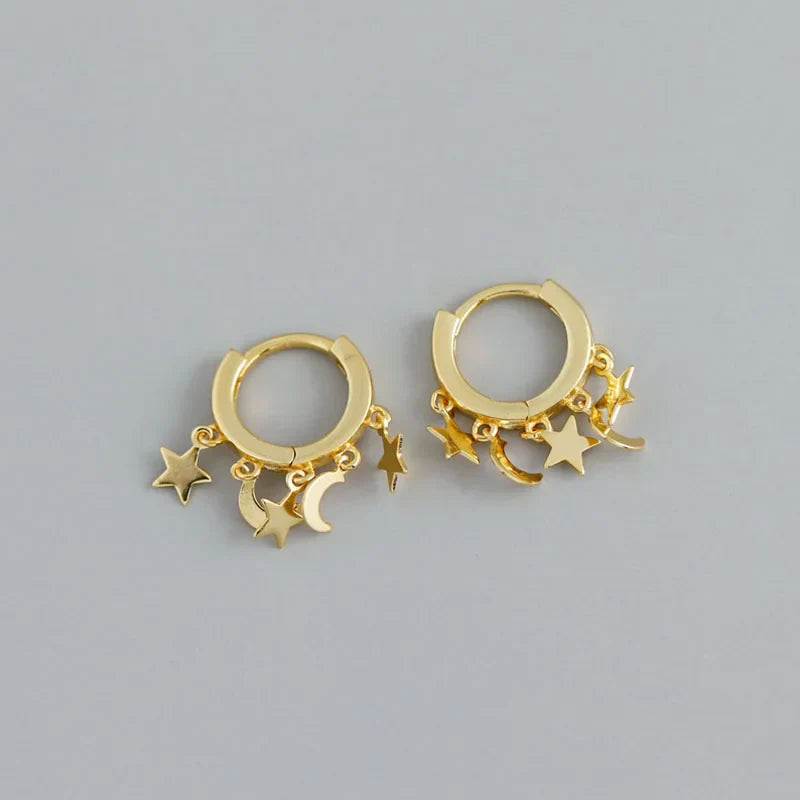 Boucles d'Oreilles Créoles Etoiles et Lunes pendantes or