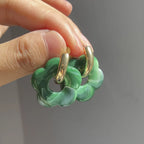 Creol-øreringer med blomst i harpiks