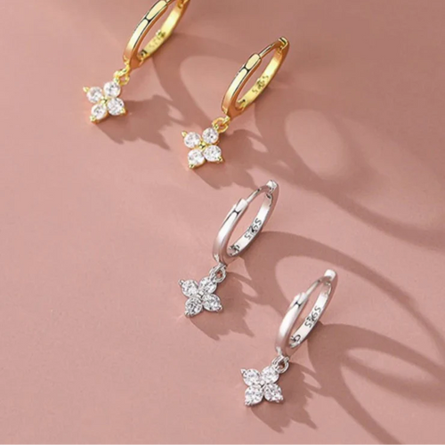 Creoløreringe med blomst og zirkonia i sølv