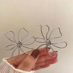 Vintage asymmetriske blomster ørestikker i sølv