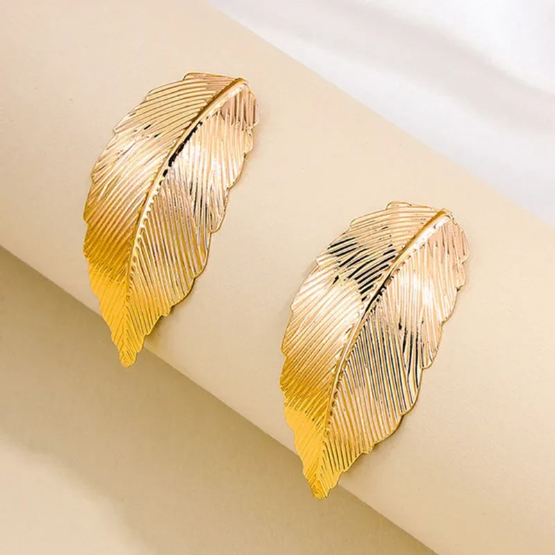 Hängande örhängen med blad för kvinnor guld