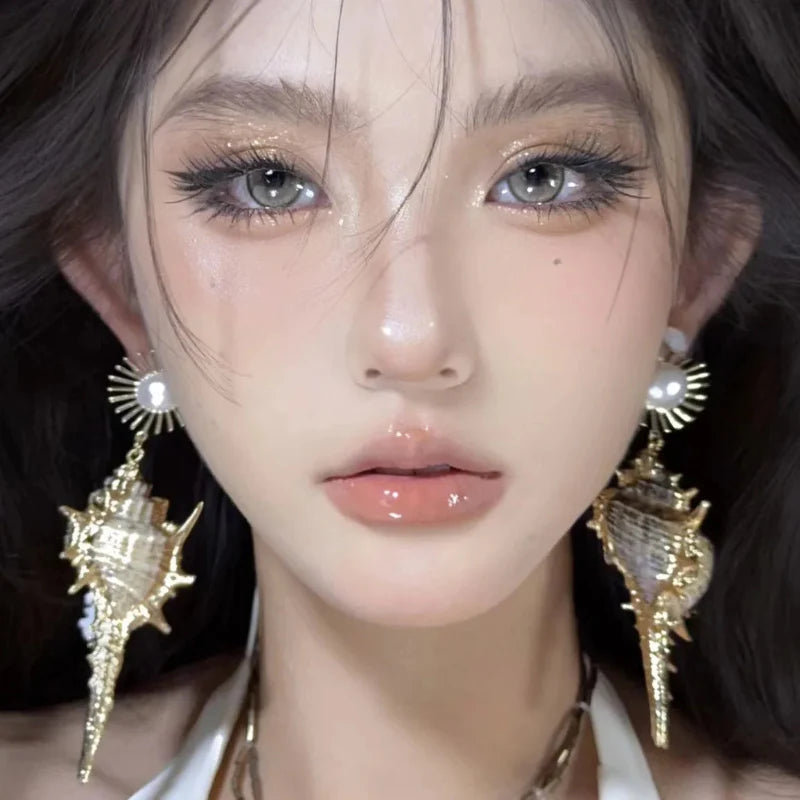 Boucles d'Oreilles Pendantes Coquillage Conque