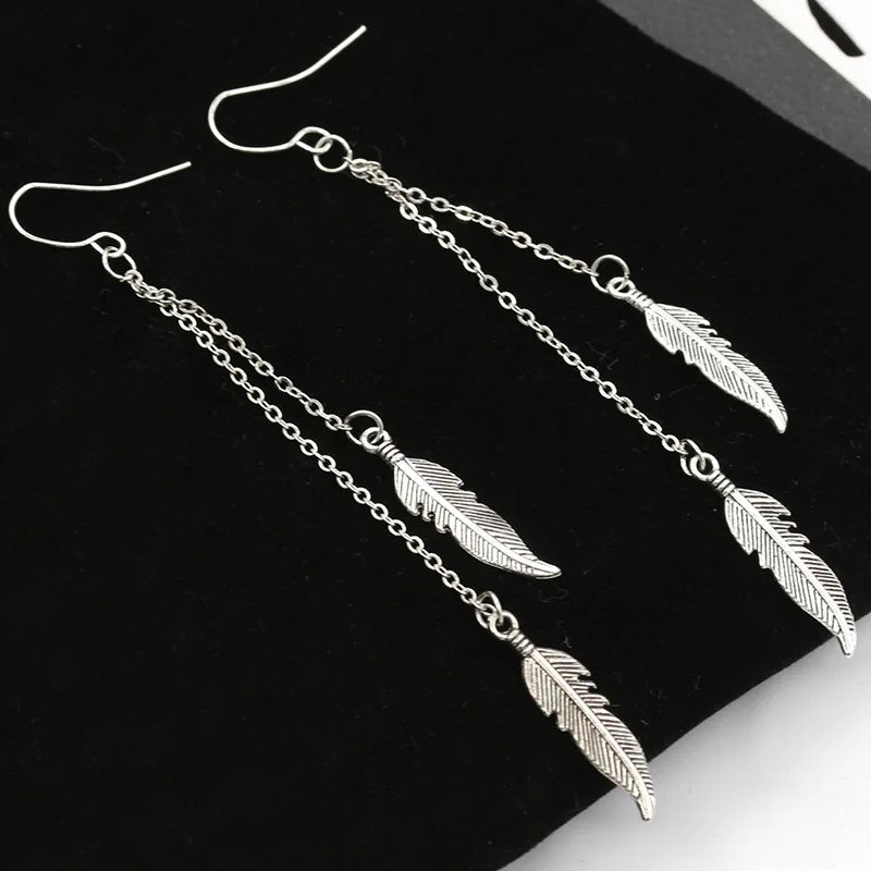 Boucles d'Oreilles Pendantes Plumes argent