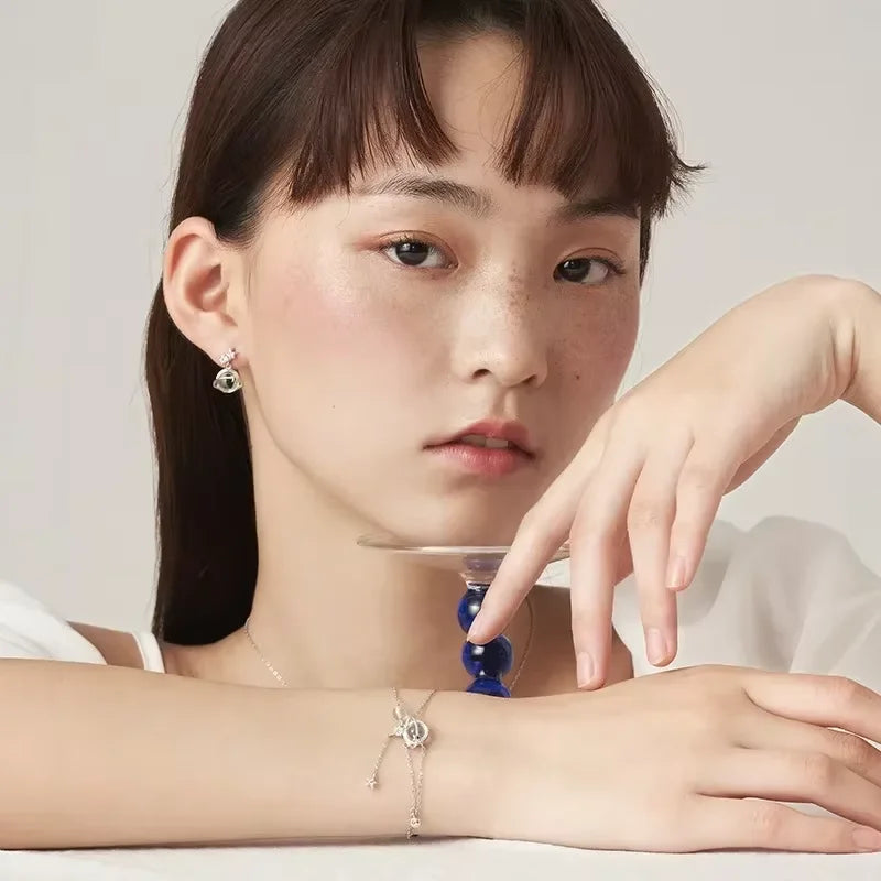 Náramek s křišťálem, měsíčním kamenem a hvězdami ze zirkonu