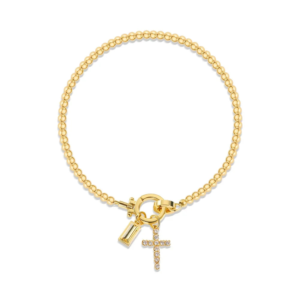 Armbånd med kors og fødselsstein