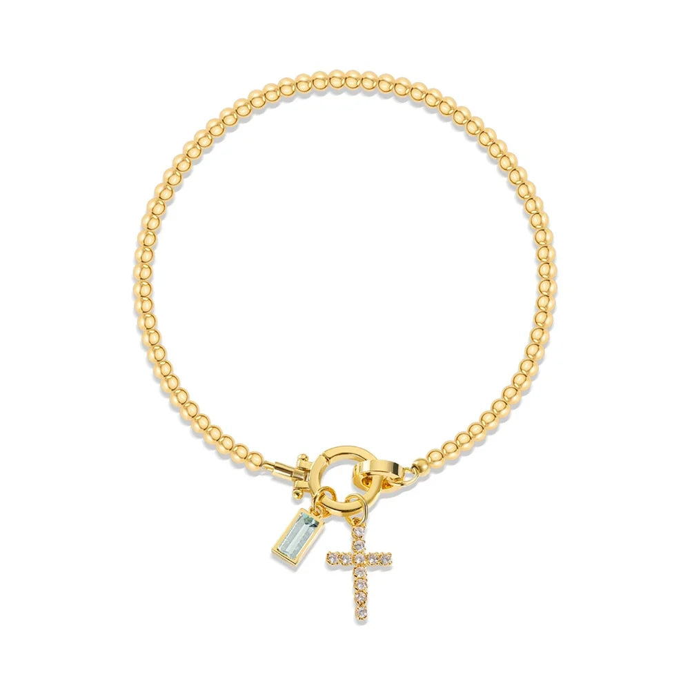 Armbånd med kors og fødselsstein