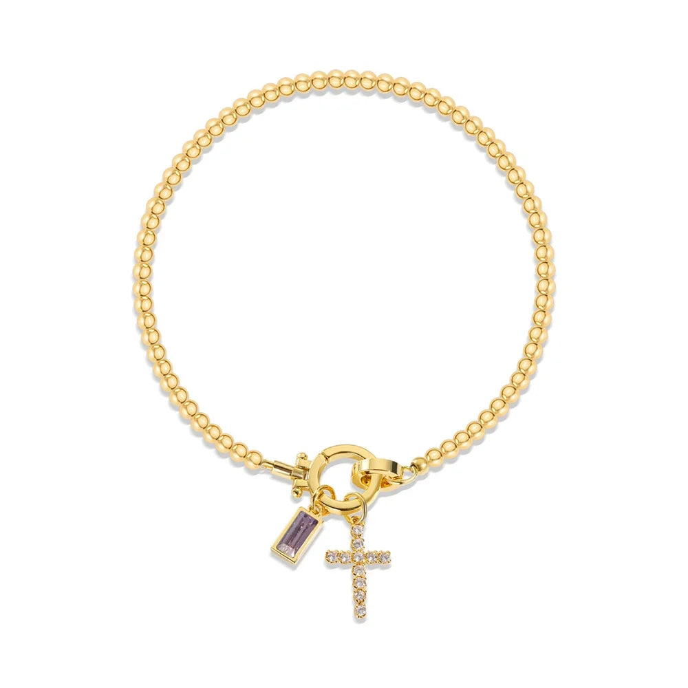 Armbånd med kors og fødselsstein