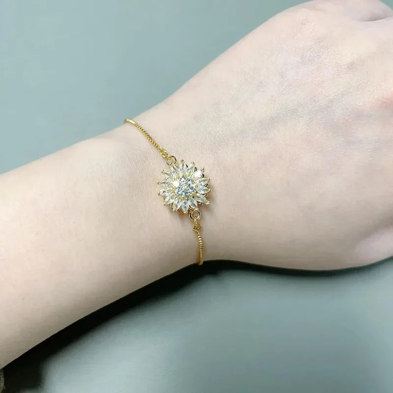 Armbånd med roterende blomst mod stress og strass 2