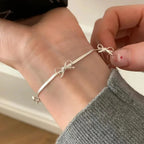 Armbånd med sløyfe til dame i sølv

