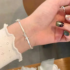 Armbånd med sløyfe til dame i sølv