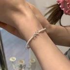 Armbånd med sløyfe til dame i hvit