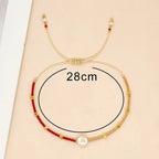 Tvåfärgat armband initial