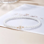 Hvidt armbånd med initial r