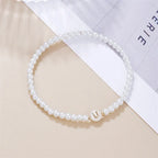 Hvidt armbånd med initial u