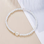 Hvidt armbånd med initial w