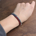 Buddhistisk Gourmette Armbånd med Skåret Amulett