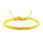 Tynt og justerbart brasiliansk armbånd gult
