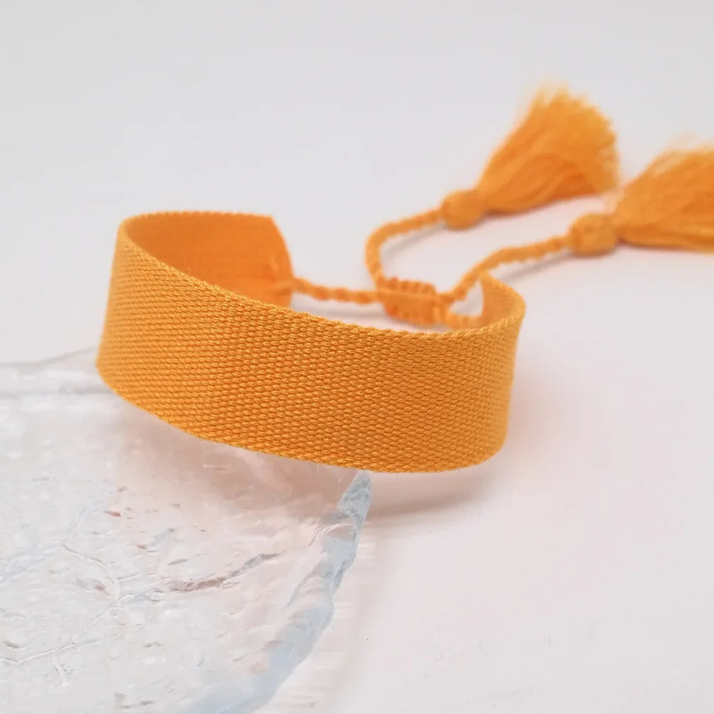 Håndlaget mykt pastell brasiliansk armbånd oransje