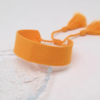 Håndlaget mykt pastell brasiliansk armbånd oransje